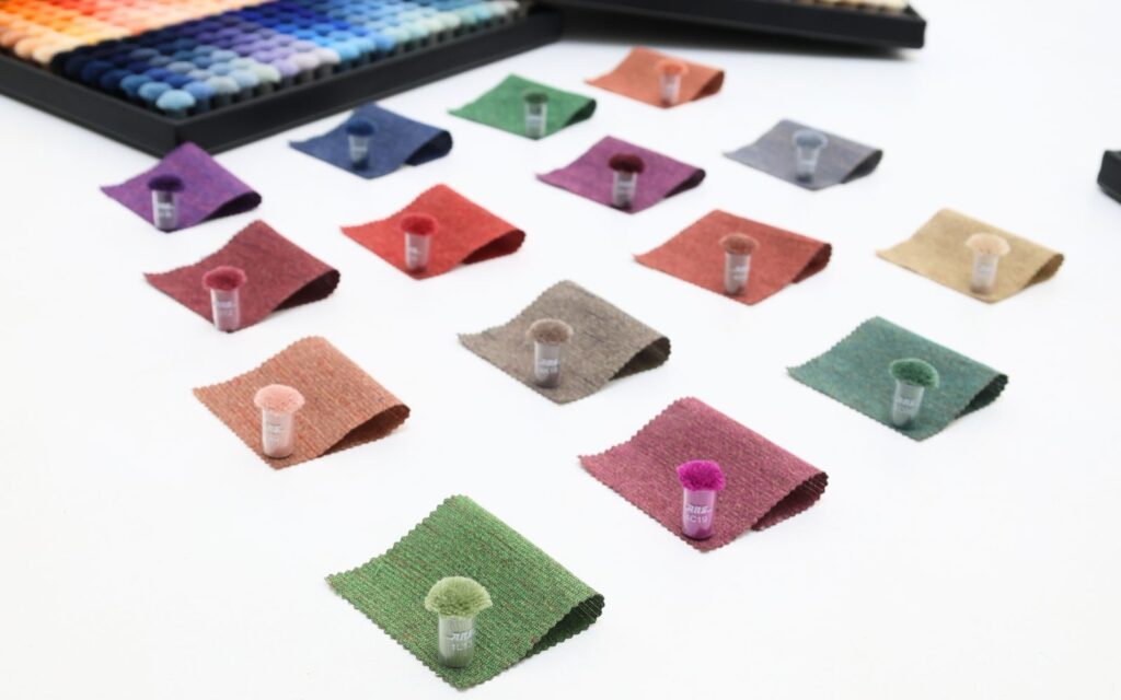 Earthy tones rugs in natural shades like olive, clay, and terracotta, styled in a warm, eco-conscious interior with soft lighting and organic textures.